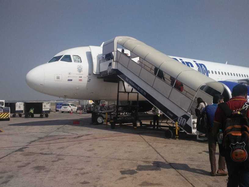 Students boarding a flight for an educational tour as part of an experiential learning and international exposure program.